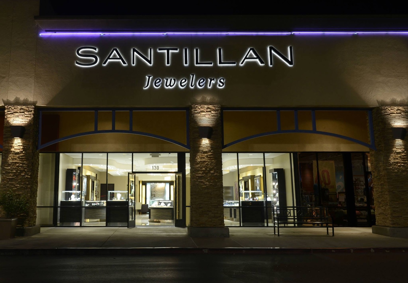 Front of Santillan Jewelers store lit up at night